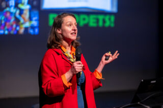Keynote Speaker Gilly Fogg on stage